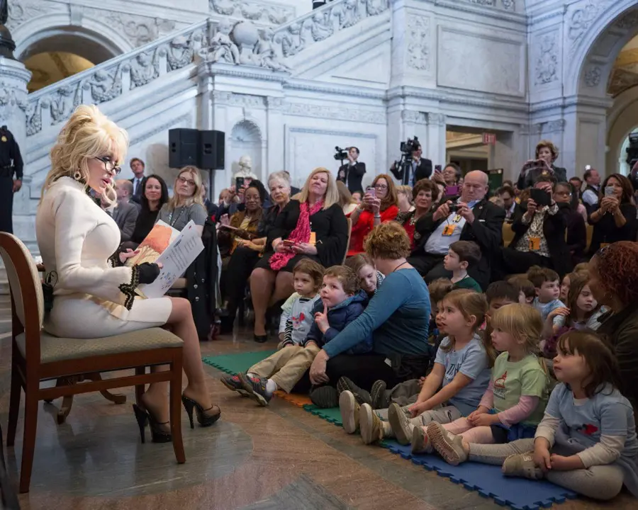 DollyParton Congress - Colorado Evaluation & Action Lab Dolly Parton reads to children at The Library of Congress.