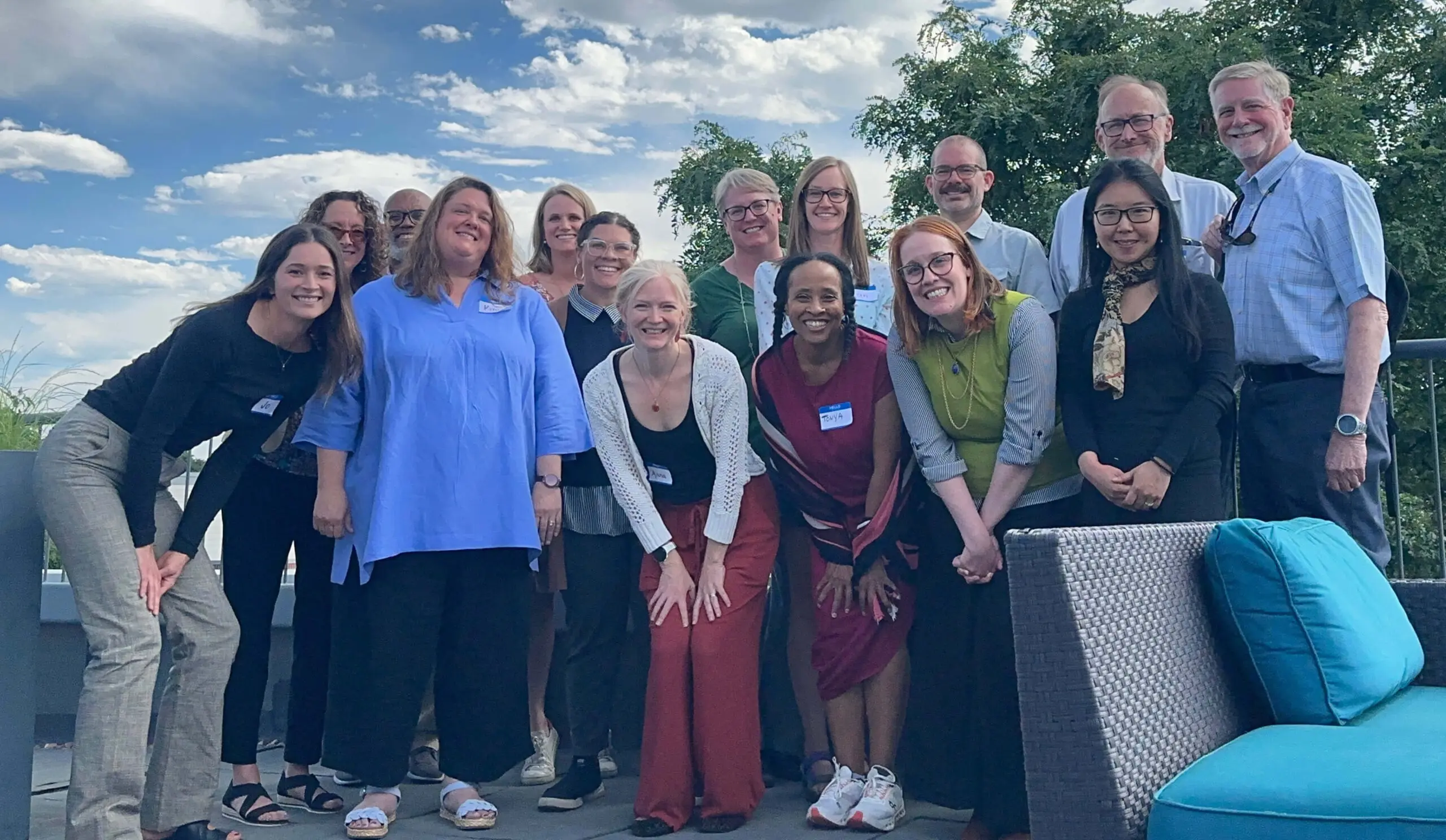 financialshocksgroup - Colorado Evaluation & Action Lab a group poses for a photo outside