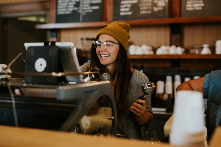 student working in coffee shop